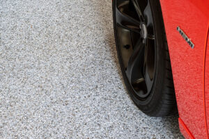 concrete polyaspartic coatings red charger on epoxy flooring